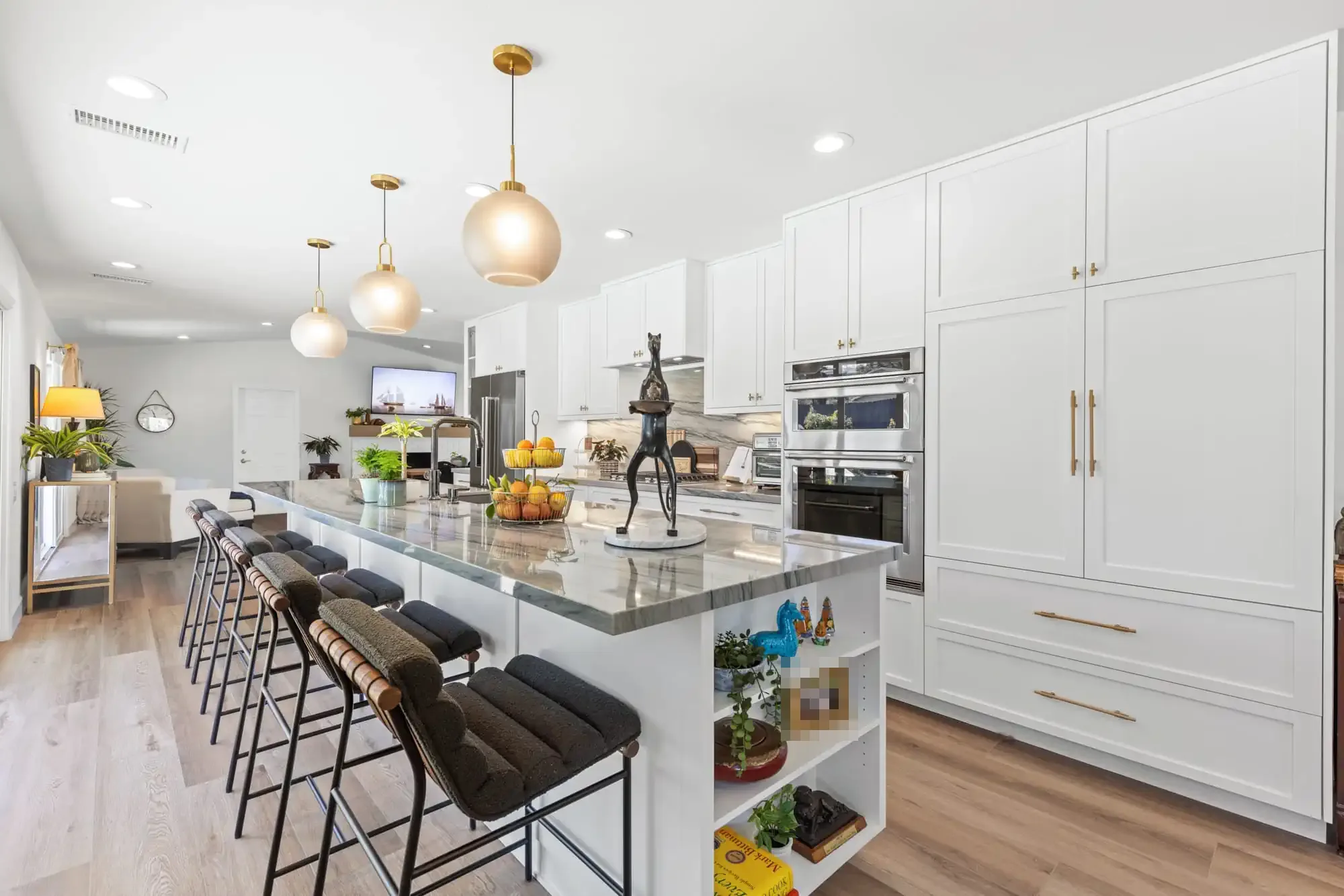 Modern El Cajon kitchen with navy cabinets and sliding glass doors