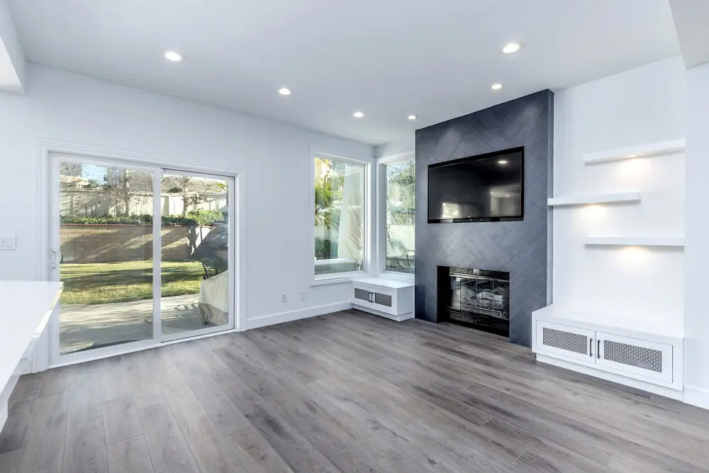 Clairemont living room with sliding glass doors and natural light