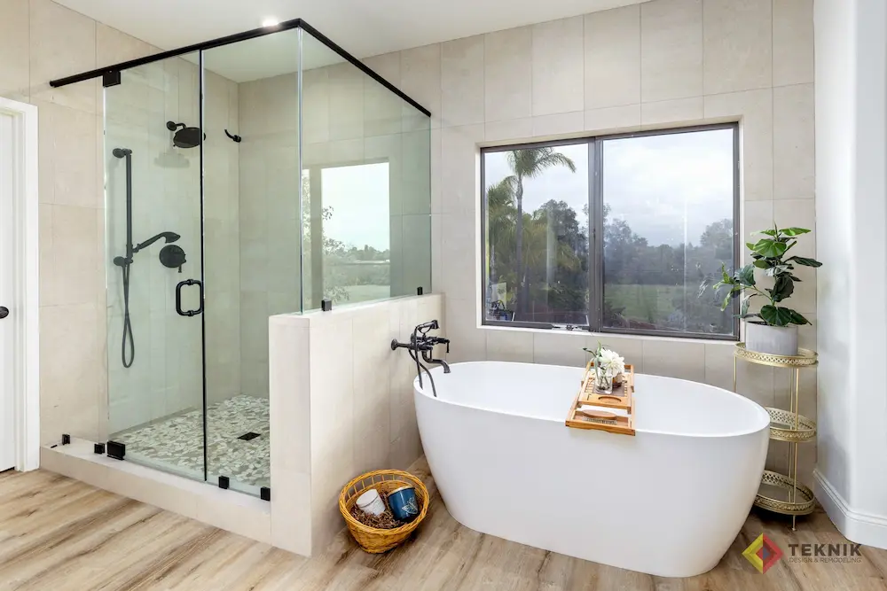 Escondido master bathroom remodel with glass shower, freestanding tub and natural light