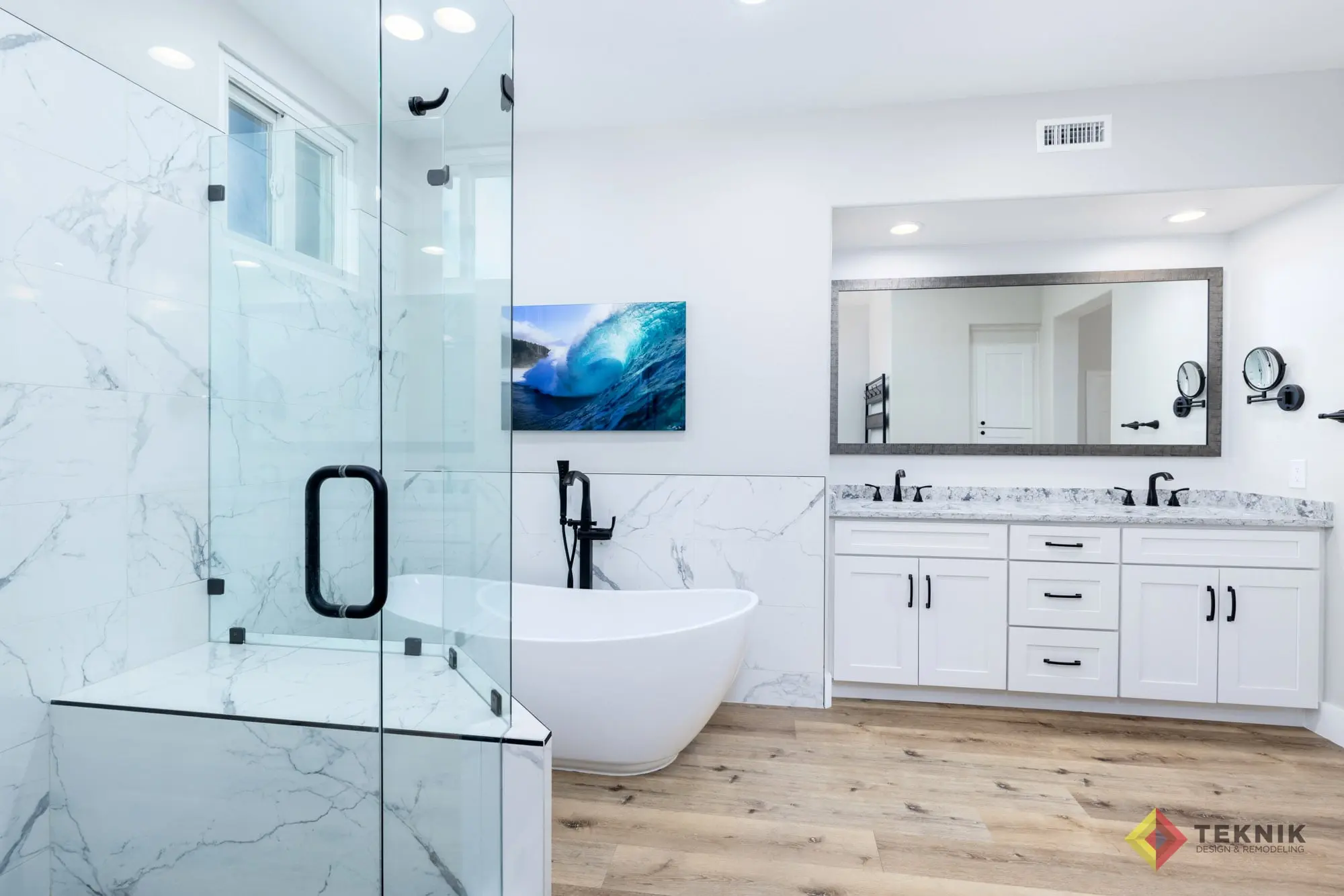 Carmel Valley bath remodel featuring walk-in shower, soaking tub and wood flooring