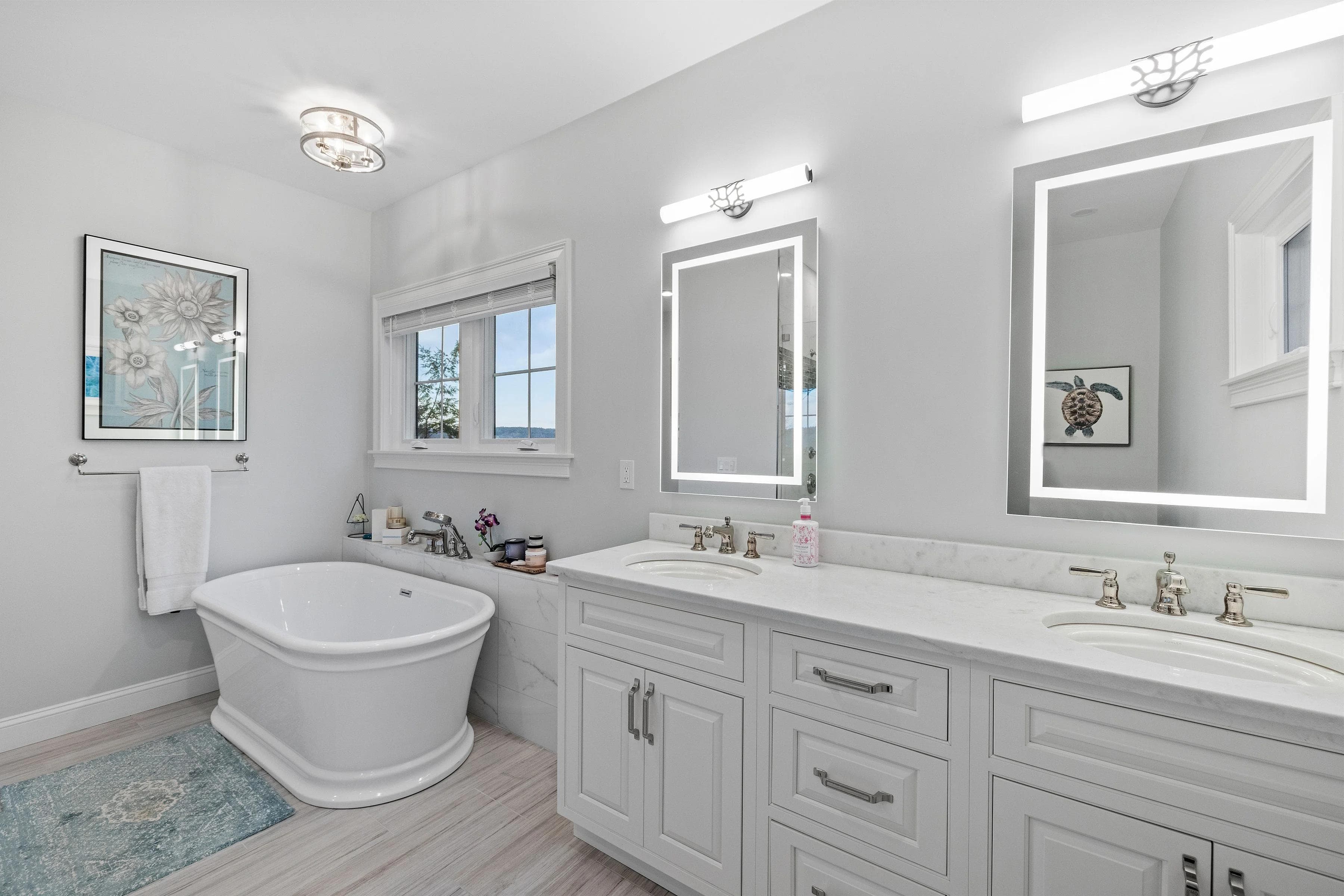 Newly remodeled San Diego master bathroom with frameless glass walk-in shower and dual vanity
