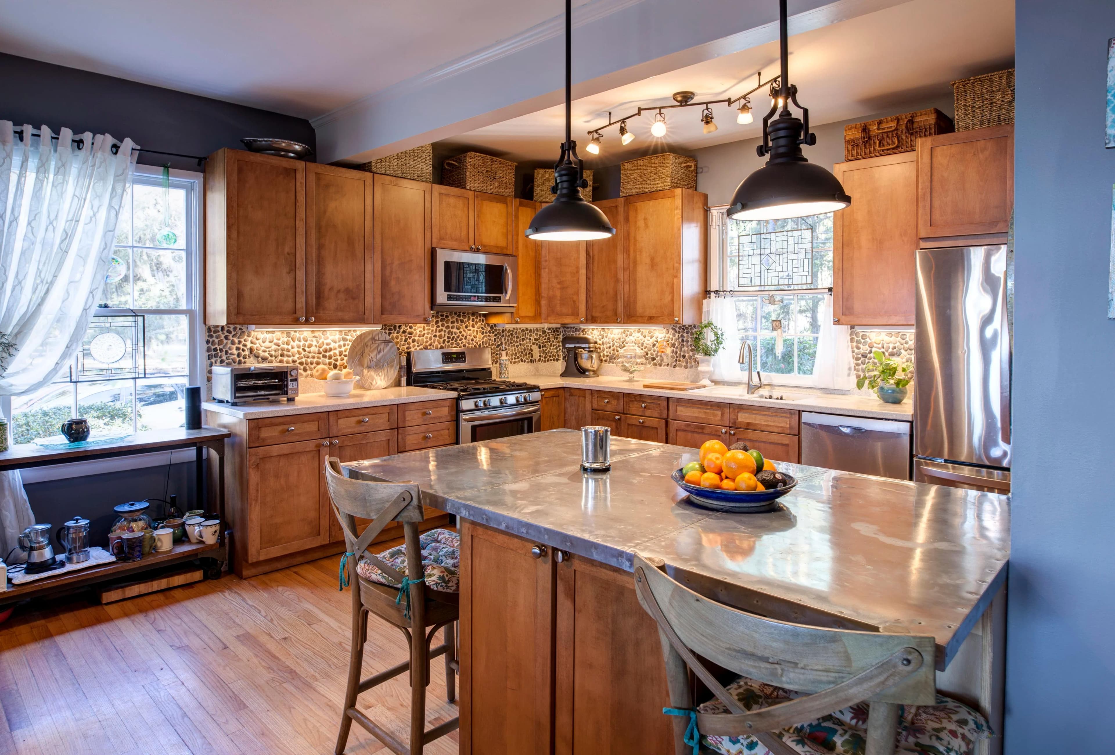 Luxury San Diego kitchen remodel with custom cabinetry, stone island, and professional-grade appliances