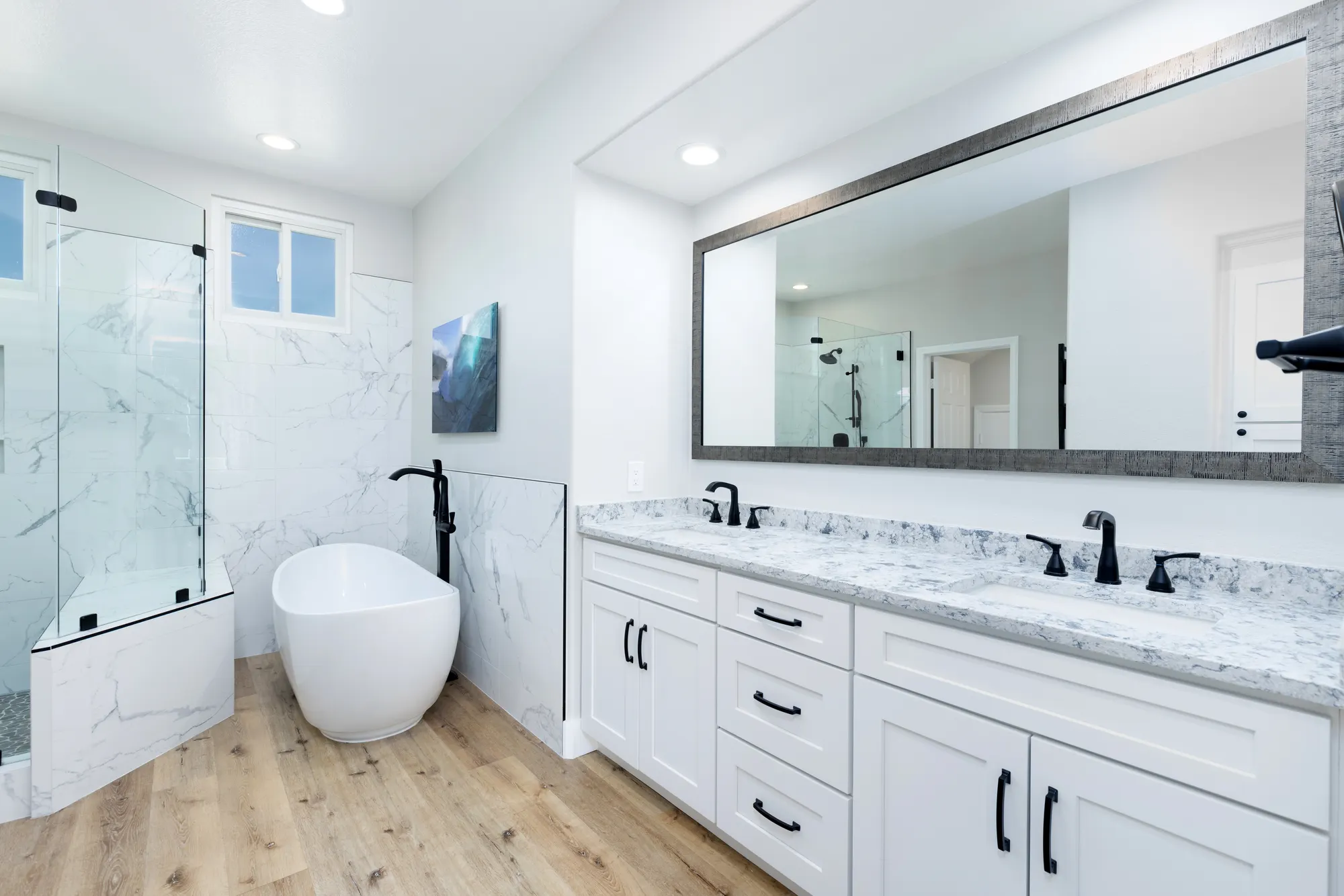 Double vanity and glass shower, from a Teknik remodel in nearby Carmel Valley
