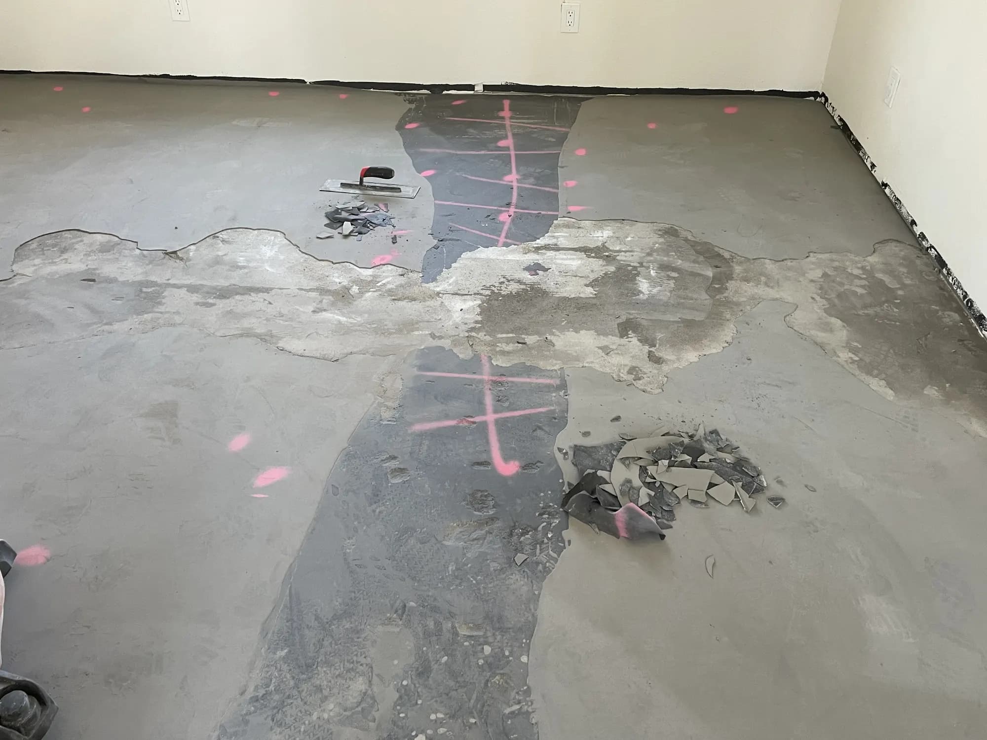 Concrete floor opened and marked during demolition