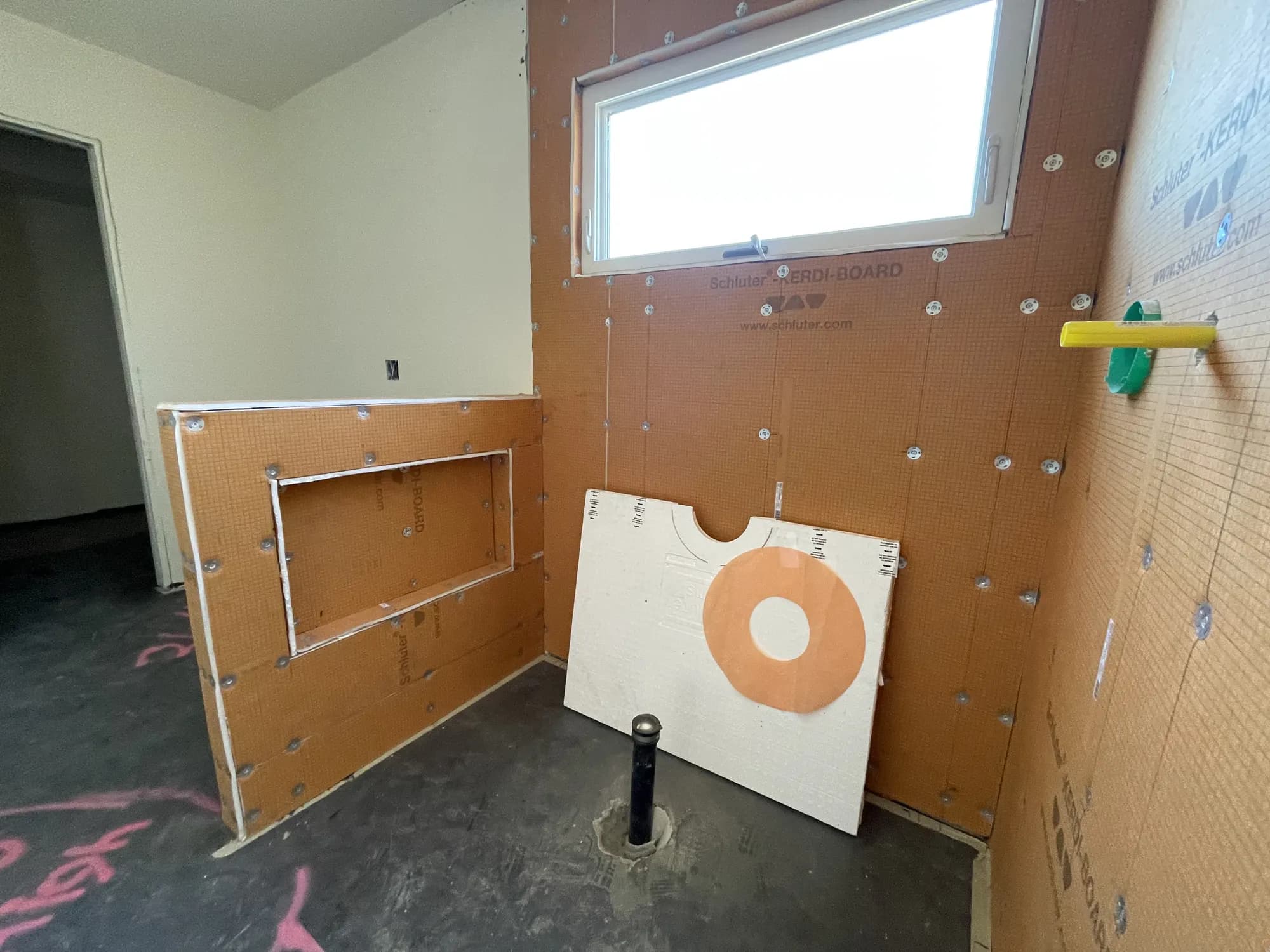 Shower walls covered in waterproofing board