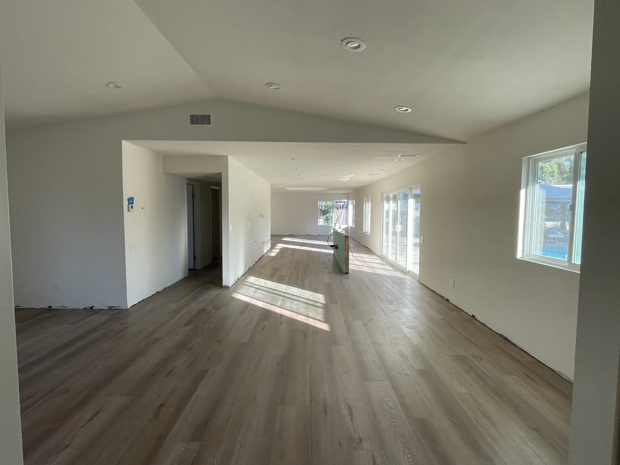 Plank flooring down through the main rooms