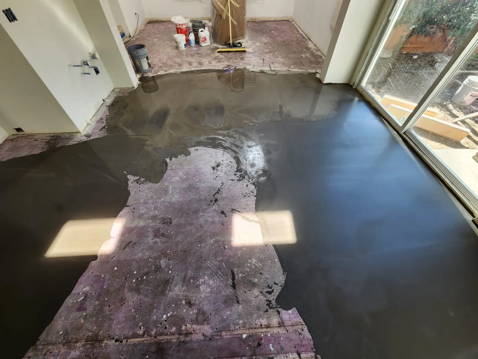 Self-leveling compound poured across the main floor
