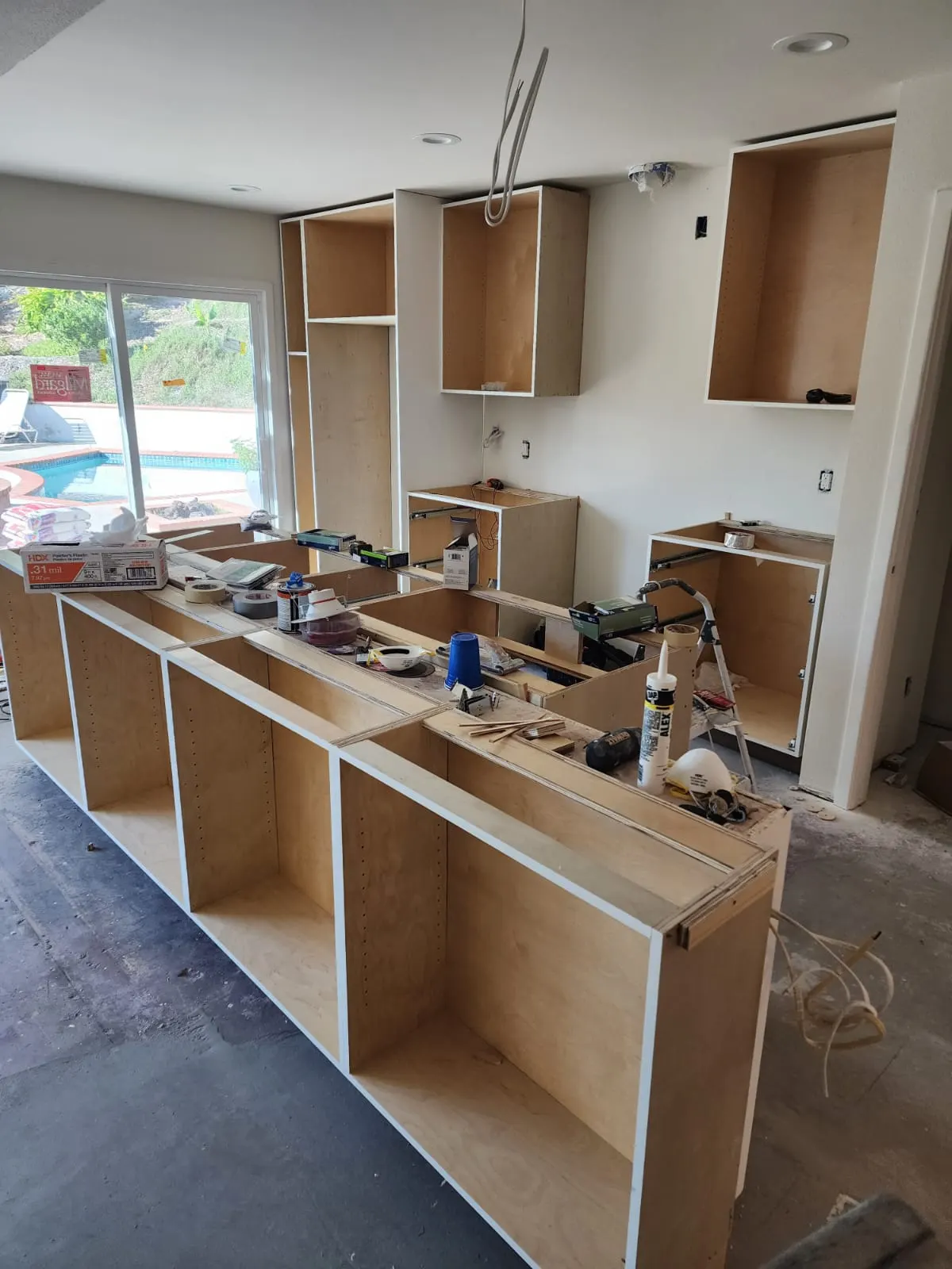 Kitchen cabinet boxes and the island set in place