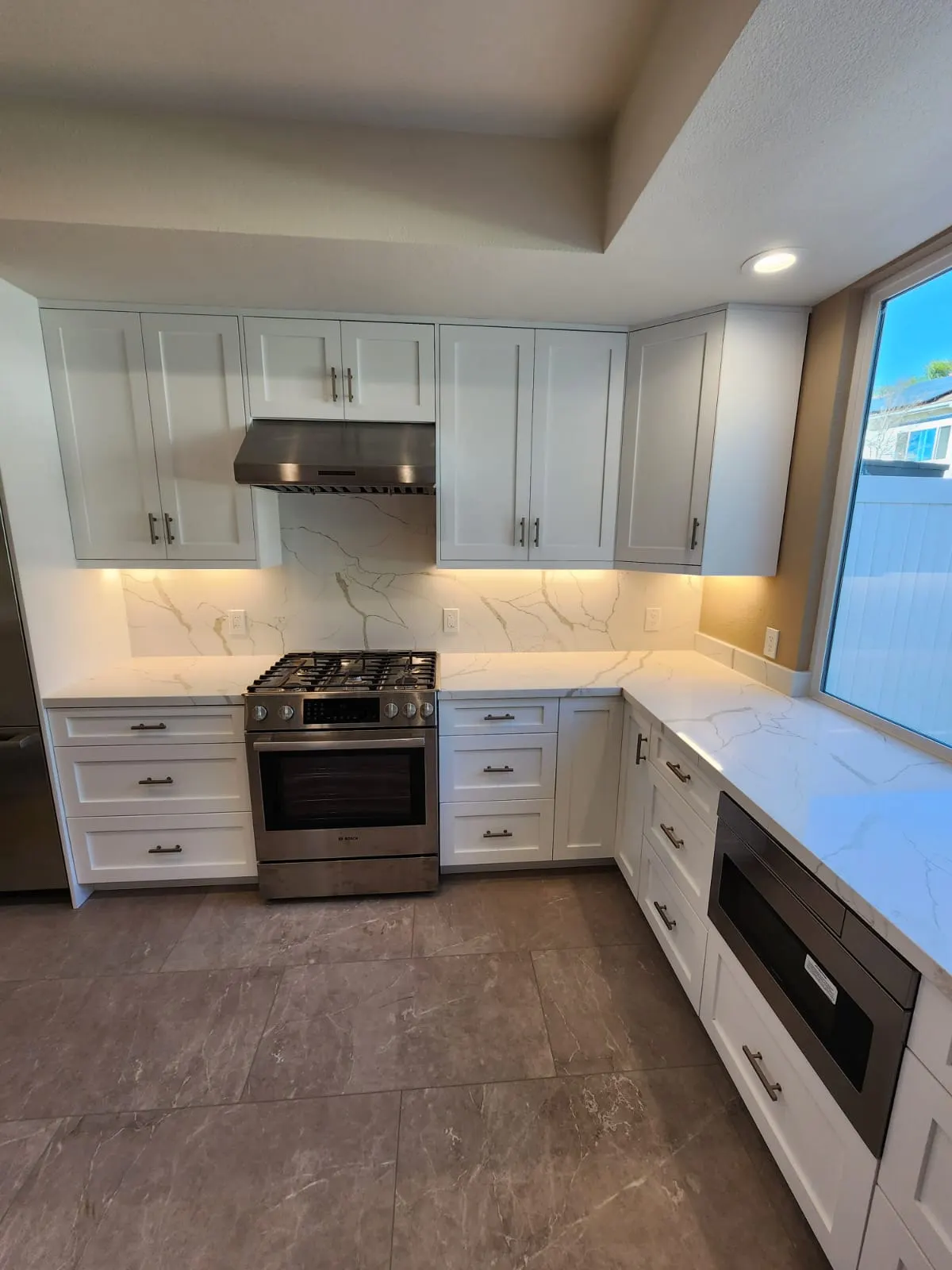 Under-cabinet lighting on, doors hung